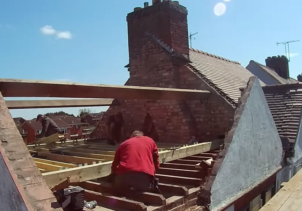 Local roofing contractors rebuilding structural roof rafters and decking on a house in Brandon FL